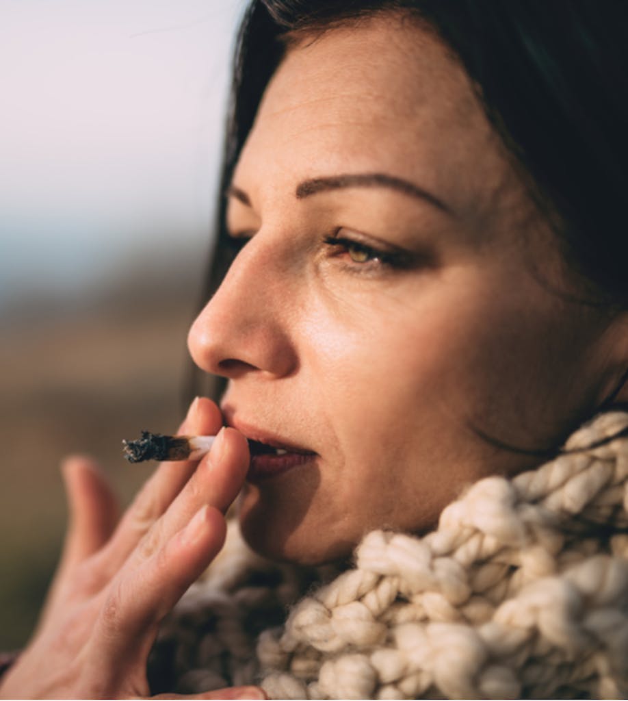 Woman smoking joint 